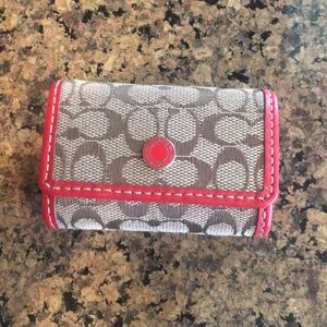 Coach contact lens case.